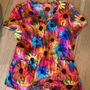 White cross scrub top.